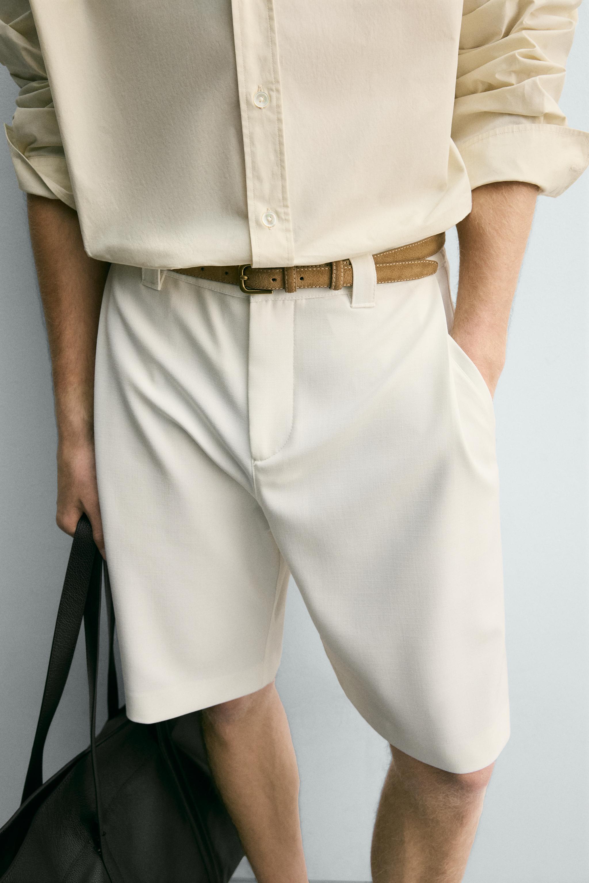 BERMUDA RELAXED FIT PLIS LATÉRAUX